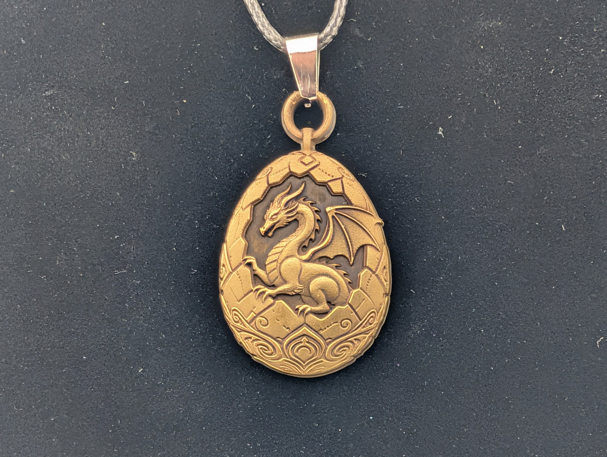 Dragon inside Egg - Brass Pendant